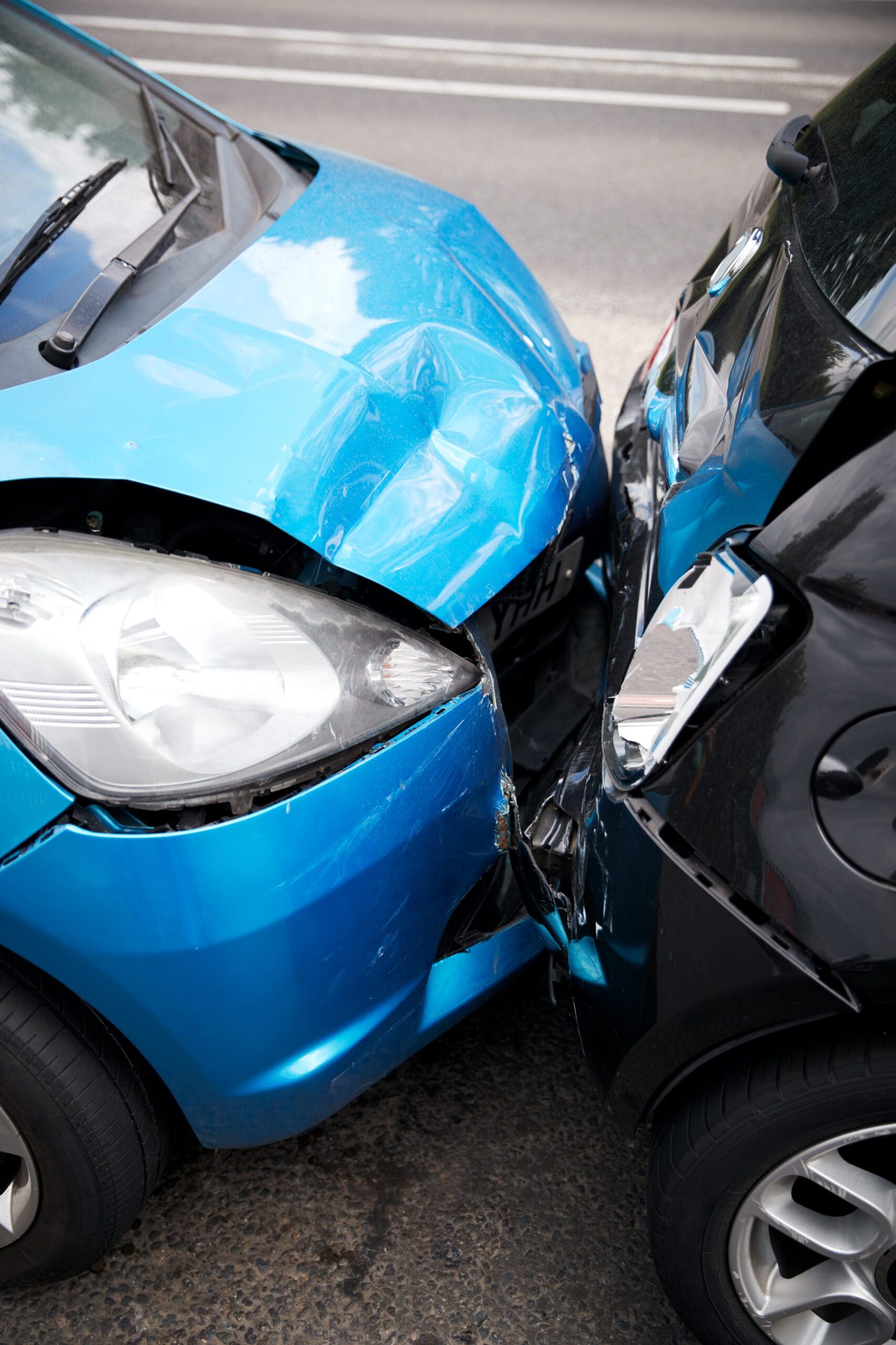 close-up-of-two-cars-damaged-in-road-tra