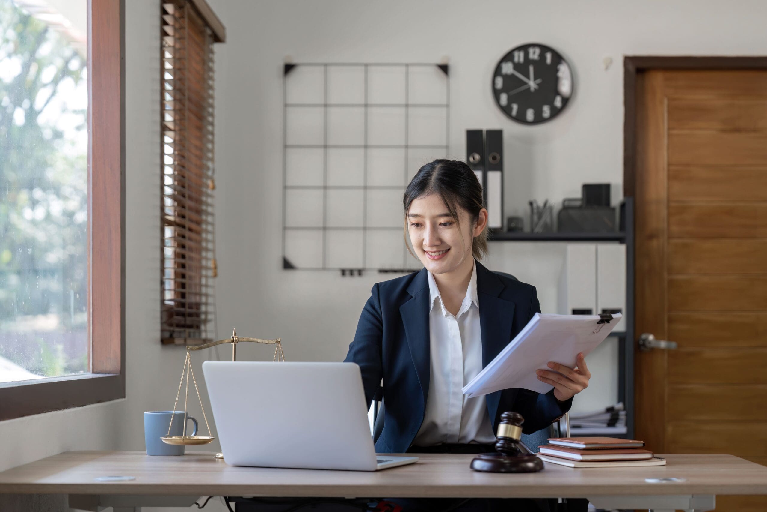 attractive-young-lawyer-in-office-business-woman-a-2023-01-25-12-51-30-utc-min-scaled.jpg